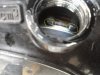 scoring under oil cap.jpg